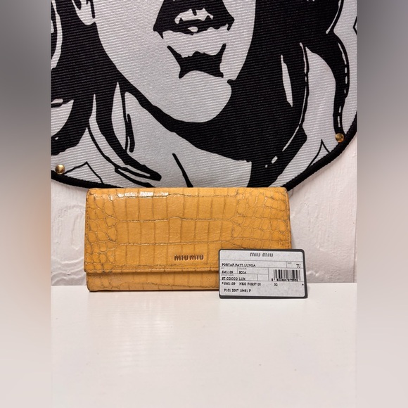 Miu Miu Handbags - Miu Miu St. Cocco long wallet in crocodile embossed leather